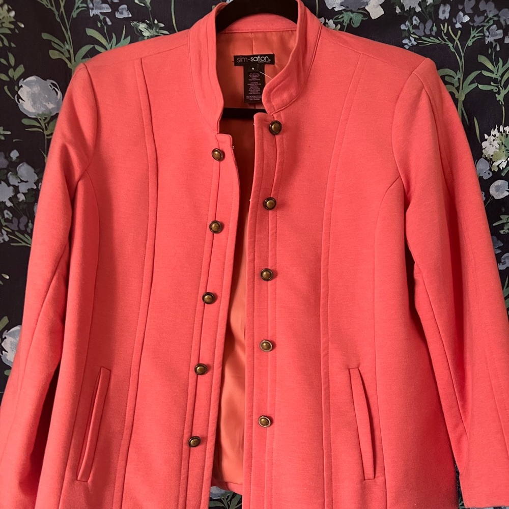 Slim- station peach color jacket.
